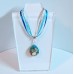 Small Teardrop Shaped Triple Seashell Pendant on Lace Necklace 1